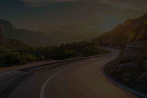 highway towards sunset background image