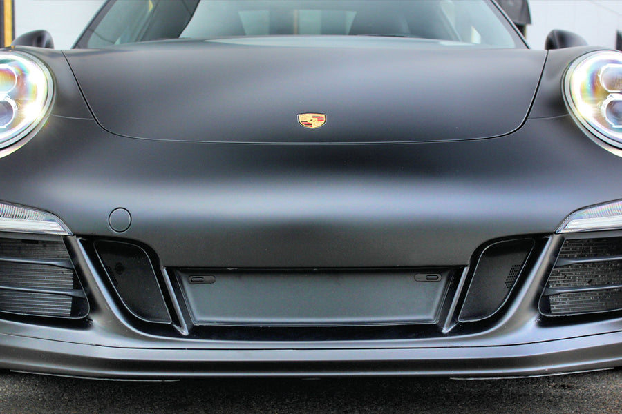 Front view of a black Porsche 991